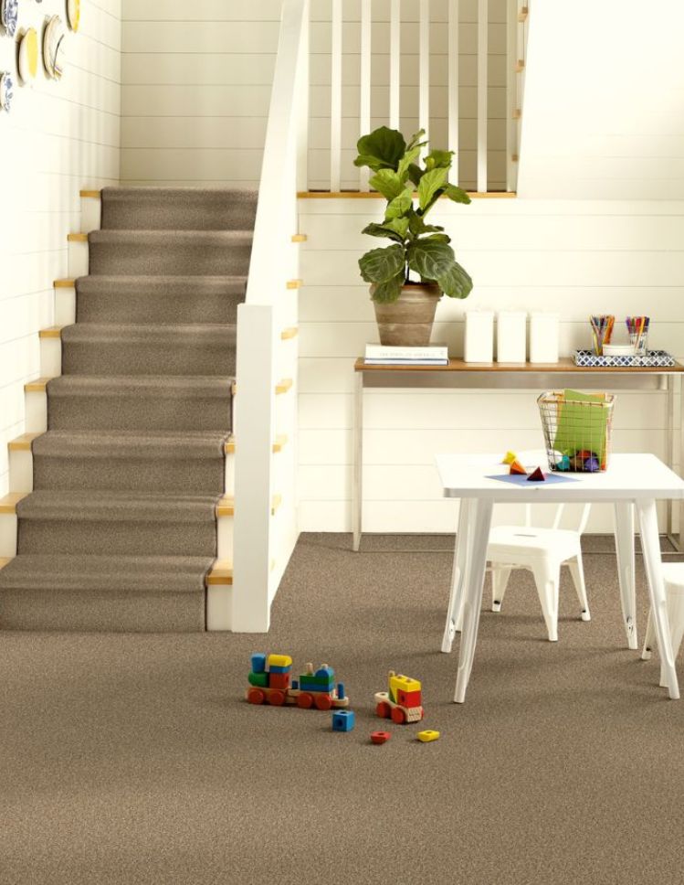 grey carpet and stair runner installation in a bright Wisconsin home