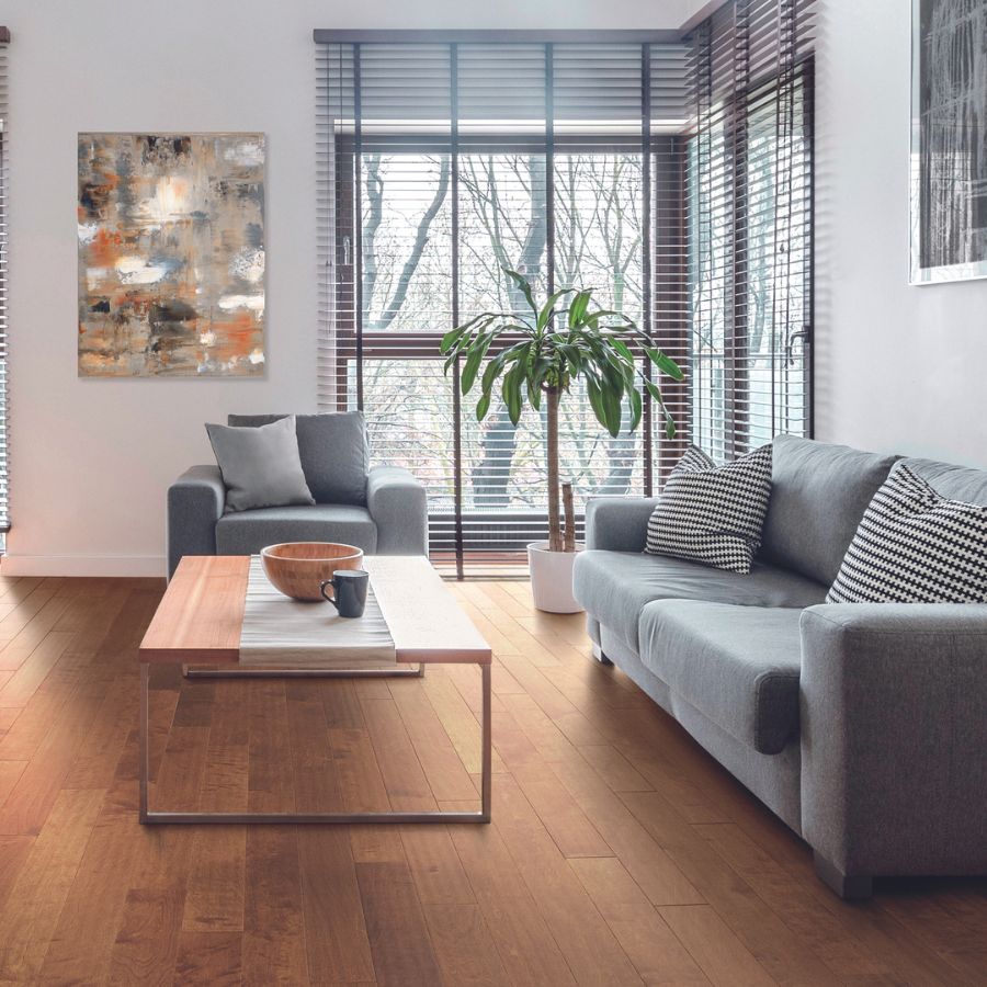 Hardwood flooring in living room grey couches