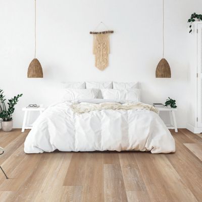 luxury vinyl plank flooring in a bright Brookfield bedroom