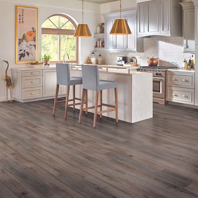 luxury vinyl plank floors in a charming Wisconsin kitchen from Floortech Interiors